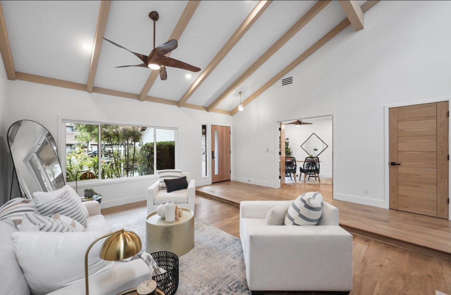 Bright living room with exposed beams in a Cresta-managed home